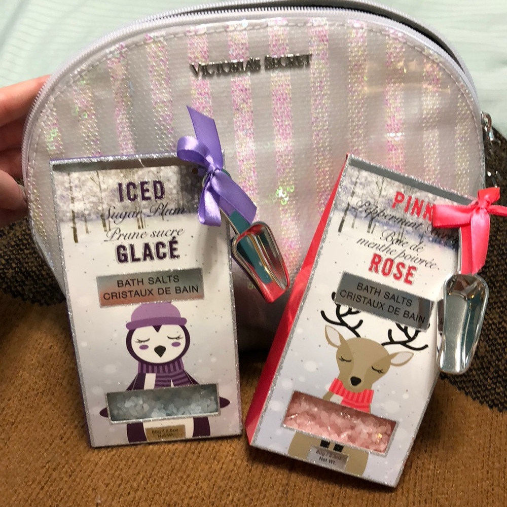 Victoria secret travel case with two bath salts.